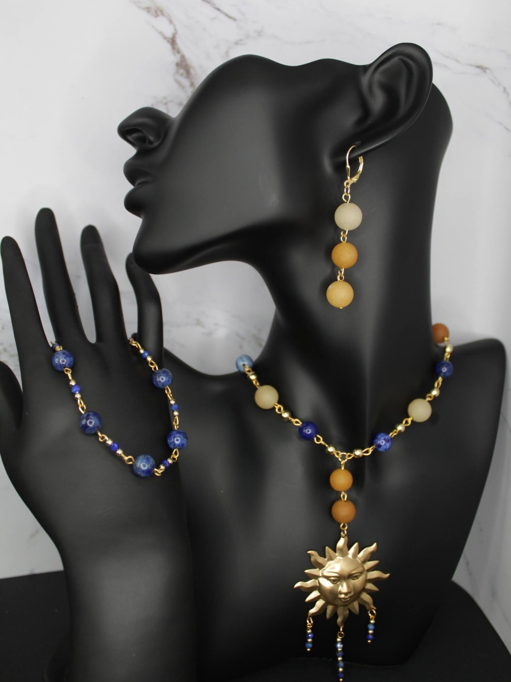 Handmade Gold Sun Pendant Necklace with Blue and Beige Beads